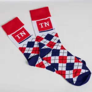 A pair of socks with the initials tn on them.