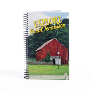 A spiral bound book with the cover of rural tennessee.